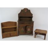 A scratch made vintage plywood miniature dresser with painted doors, a similar table and a small