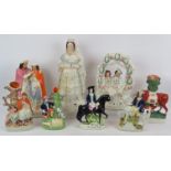 Eight 19th century Staffordshire pottery flat back figures including Queen Victoria, Dick Turpin,