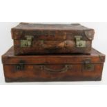 Two large vintage leather suitcases both with cambric lining. Largest 76cm x 45cm. (2). Condition