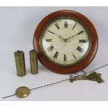 A 19th century striking wall clock in walnut case with painted dial. Brass cased weights and