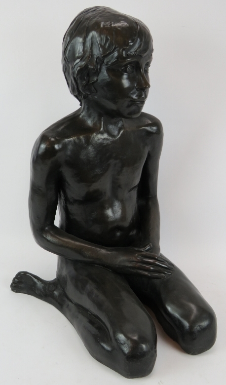 A large bronzed figure of a crouching child, almost life-sized, unsigned. Height 63cm. Condition