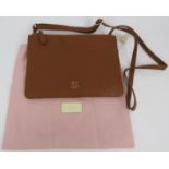 A small Radley tan leather shoulder bag with twin zipped pockets. Original dust bag and paperwork.