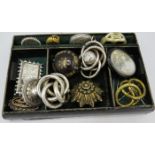 A collection of ladies brooches to include two Victorian pique brooches, eight metal brooches,