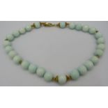 A Larimar gemstone 19" necklace, 14mm round faceted beads of even size, lobster clasp, stamped 750