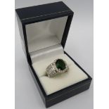 A Russian diopside gemstone ring, size L, good colour saturation, boxed. Condition report: Excellent