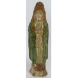A small Chinese Sancai funerary figure with green glaze cloak and amber glazed hood. Probably Tang