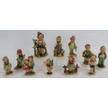 11 mixed German Goebel figurines 1930s onwards. Tallest 14cm. (11). Condition report: One boy with