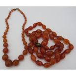 Two vintage graduated carnelian bead necklaces. Condition report: No issues.