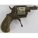 An antique 8 shot starting pistol with folding trigger and walnut grips. Probably Belgian. Length: