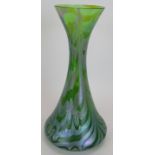 An Art Nouveau style irridescent glass vase in the style of Loetz. 28cm high. Condition report: