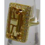 A large citrine, 23mm x 13mm, portrait ring octagon step cut solitaire, size N, 14k yellow gold/925.