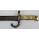 A 19th century French Chassepot model 1866 bayonet with brass handle. Stamped T10444. Length 69cm.