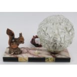 A French Art Deco lamp featuring a coppered squirrel mounted on a marble base. Length 26cm. Height