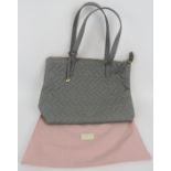 A large Radley grey leather tote bag with quilted front and fully lined. Original dust bag. All