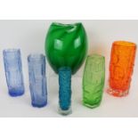 Six mid-century glass vases including a 7.5" tangerine Whitefriars bark vase, a pair of blue