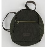 An olive green quilted polyester Barbour backpack style hand bag. All handbags purchased direct from