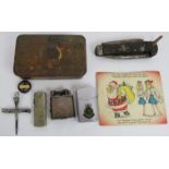 A Dunhill lift arm cigarette lighter, a WWI Princess Mary tin, 1937 Naval knife, two other lighters,