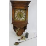 An Antique Petworth clock movement by John Tribe 9" dial mounted in later oak case. Weight and