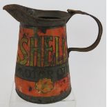 A vintage Shell motor oil quart jug circa 1930 with lead excise measure seal. Height 18cm. Condition