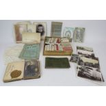 A collection of cigarette cards in boxes, a 19th century autograph album, Cranbrook and area