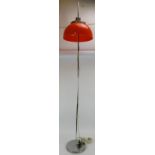 A classic 1970s Italian 'Faro' floor lamp designed by Harvey Guzzini. Orange shade on chrome