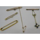 Four 9ct gold bar brooches, two with seed pearls, one plain, one with a plain bar and hanging