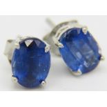 A pair of silver tanzanite stud earrings. Condition report: Good condition.