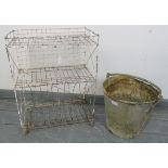 A 19th century wirework two-tier plant stand, together with a vintage galvanized bucket/planter.