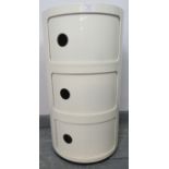 A mid-century modern white acrylic drum cabinet by Kartell, of three compartments with sliding
