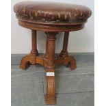 A Victorian medium oak music stool, with rexine seat. Condition report: Some wear to rexine. H40cm
