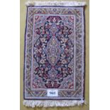 A small Persian rug soft muted colours. 96cm x 60cm (approx). Condition very good.