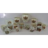 A set of 3 George V silver jubilee jugs, nine pieces of George V commemorative ware, two pieces of