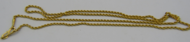 A yellow metal rope twist necklace with 'S' shaped clasp having indistinct marks. Probably Omani,