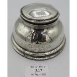 A bulbous shaped silver inkwell lacking glass liner, Birmingham 1927, approx 5" across. Condition