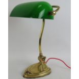 A 1920s Art Nouveau brass banker's desk lamp with green glass shade recently refurbished. Height