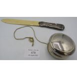 A silver yoyo, London 1996, makers MCH and a white metal handled paper knife, marked '