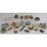 A collection of geological specimen crystals and minerals to include Garnets, Amethyst, Calcite,