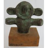 A small bronze surrealist figural sculpture signed Max Ernst. Height 13cm.