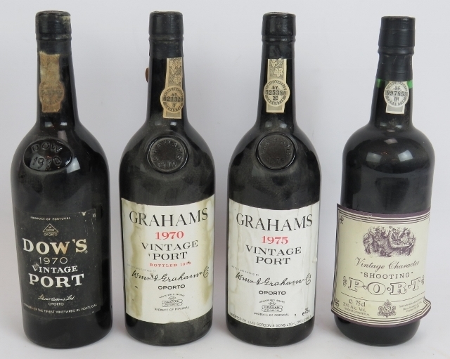 Three bottles of vintage port to include Dow's 1970, Grahams 1970, Grahams 1975 and a bottle of