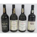 Three bottles of vintage port to include Dow's 1970, Grahams 1970, Grahams 1975 and a bottle of