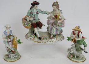 A Sitzendorf porcelain figure of a courting couple and two Sitzendorf figurines of country peasants.