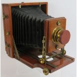 An 1899 Instantograph Patent camera with mahogany body, brass fittings and Taylor, Taylor &