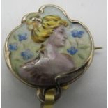 A fine Art Nouveau German enamelled brooch/pendant of a lady with forget-me-nots around her,