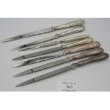 A collection of seven silver handled paper knives, all fully hallmarked. Condition report: Good