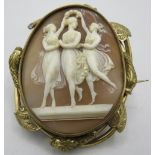 A large fine quality yellow metal cameo brooch depicting 'The Three Graces' with serpent heads and