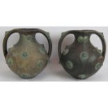 A pair of superb Chinese pottery Amphorae adorned with bronze decor, believed to be Han Dynasty,
