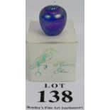 A Heron Glass iridescent blue glass apple ornament or paperweight in original box. Height 5cm.