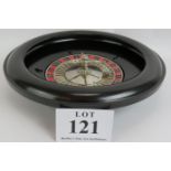 A vintage Chad Valley roulette wheel c1950s/60s with Bakelite body and cast metal spinner. Ball