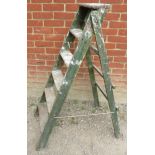 A set of vintage six tread wooden step ladders with age related paint staining. Height 120cm.