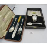 A silver egg cup, Birmingham 1966 & silver spoon, Sheffield 1926, boxed and a three piece